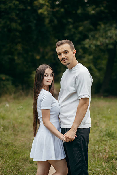 istock Young couple walking at nature at summer 2241598661