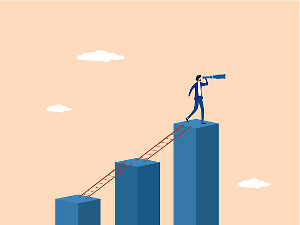 istock businessman on a bar chart looks for new opportunities 2241598667