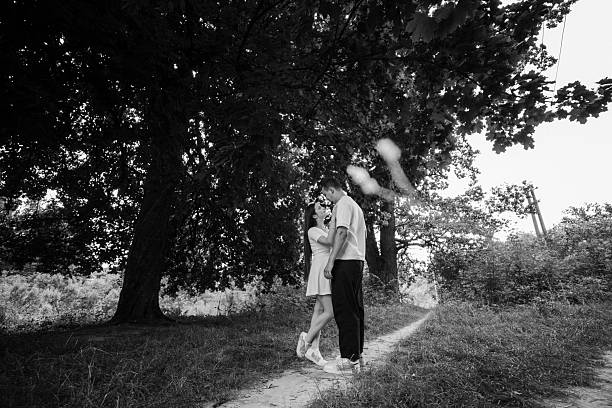Silhouette Couple Kissing Against Clear Sky