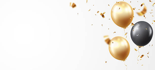 istock Black and gold balloons with confetti and ribbons 2241600345