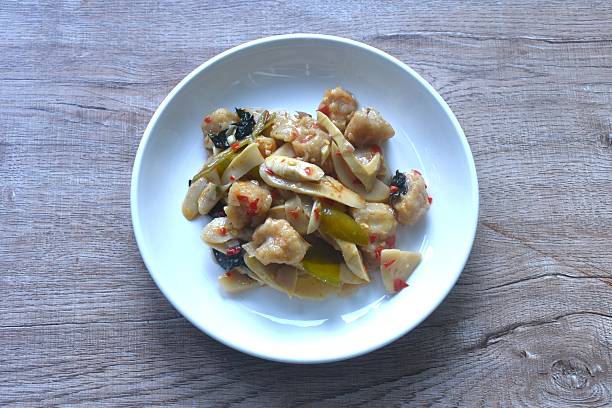 istock spicy stir fried slice bamboo shoot and fish ball with curry 2241602928