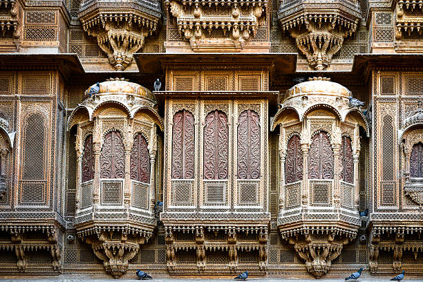Detailed view of the intricate sandstone carvings and balconies of Patwon Ki Haveli in Jaisalmer, Rajasthan, India