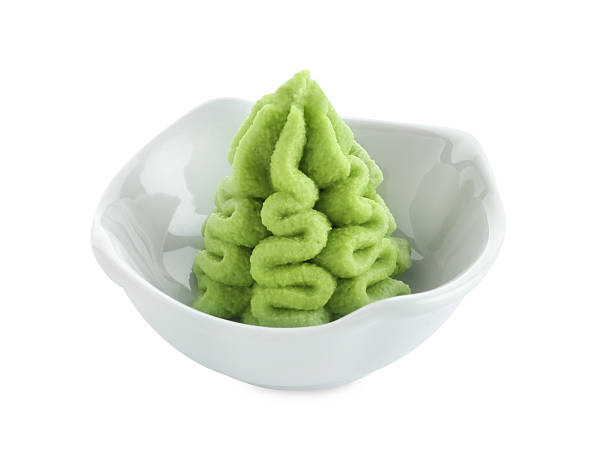 istock Hot wasabi paste in bowl isolated on white 2241608052