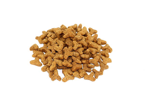 istock Premium or super-premium dry cat food, triangular shape, isolated on white background. 2241612440