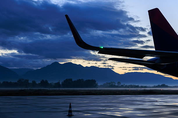 Airplane at airport at dusk