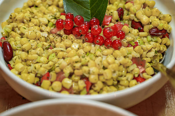 corn salad — a refreshing, colorful combination containing sweet corn, red beans, chopped bell pepper and leeks