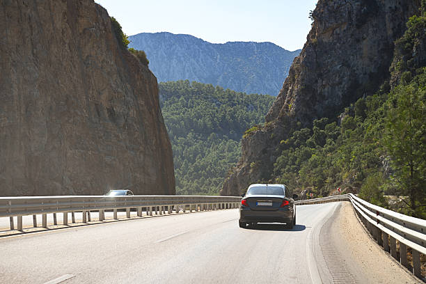 istock Highway leading into the mountains 2241614284