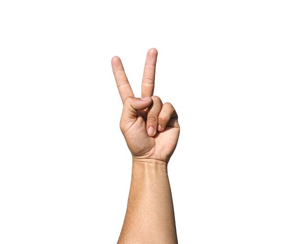 istock Male hand making two fingers gesture isolated on white background. 2241615213