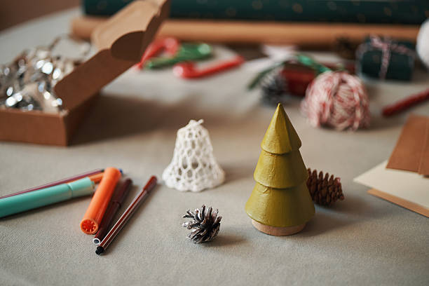 istock Handmade Christmas Decorations and Craft Supplies Arranging on Table 2241616615