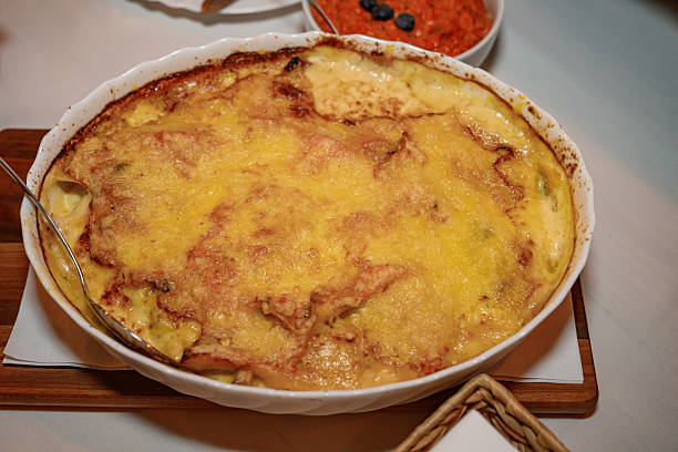 istock Moussaka is a Balkan oven dish. Potatoes, minced pork, fried onions in layers. 2241617640