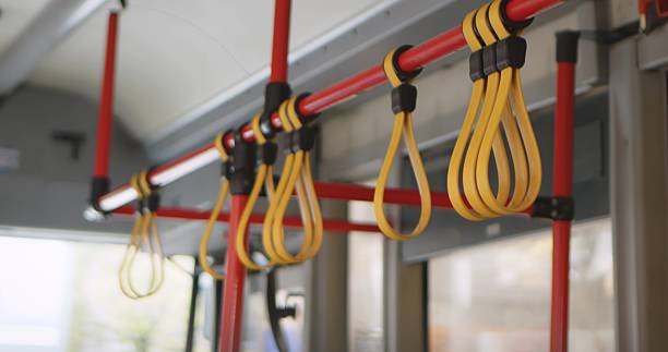 istock Yellow Hand Grips Inside Public Transportation Bus 2241617966