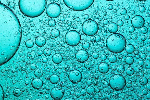 istock Blue macro drink bubble texture,Macro of water bubbles surface,Interesting background of blue coffee foam in closeup 2241618165
