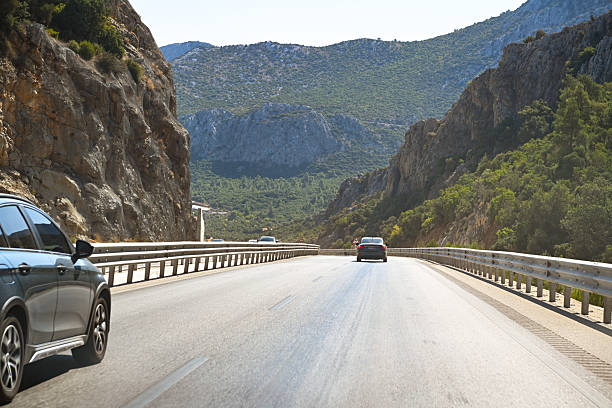 istock Highway leading into the mountains 2241618350