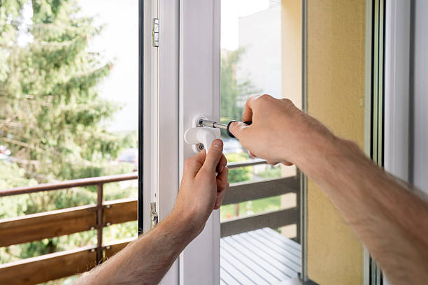 istock Repairman installing a pvc window frame in a residential apartment 2241625578