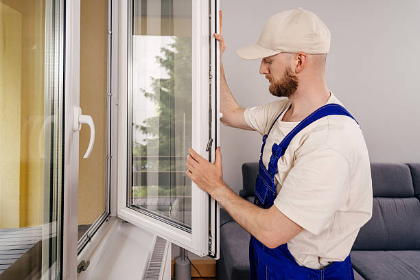 istock Repairman installing a pvc window frame in a modern residential apartment 2241625582