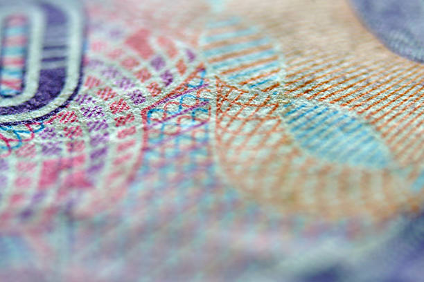 istock Close-up View of Intricate Textures on Colorful Currency Note 2241632526