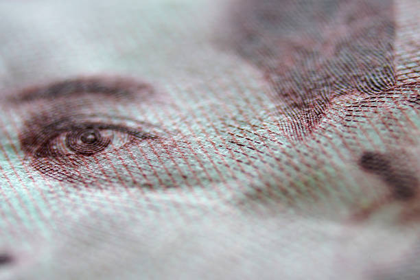 istock Close-Up View of Detailed Currency Texture with Eye Feature 2241632543