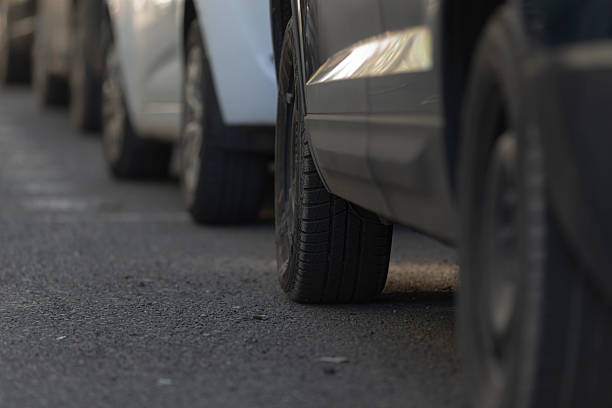 istock urban residential setting with precise wheel and pavement details 2241650079