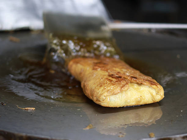 istock The process of making or cooking an Martabak Telur. 2241650949