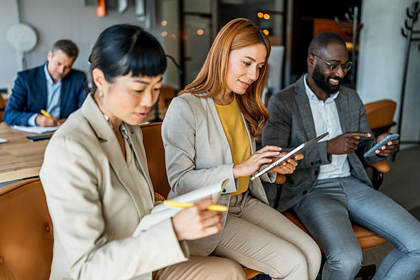 istock Diverse business professionals working during office meeting 2241651866