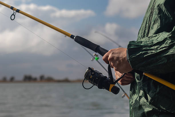 istock Unrecognizable man fishing 2241658528