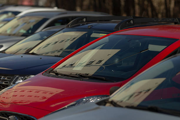 istock cars aligned in suburban setting undergoing inspection and quality 2241659752
