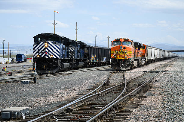 Helena, MT, USA - May 4, 2025; BNSF and Montana Rail Link trains with freight  of coal and bulk cargo