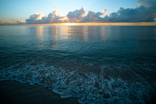 Sea beach with dramatic sky sunset or sunrise. Cloudscape over the sunset sea. Sunset at tropical beach. Nature sunset landscape of sea