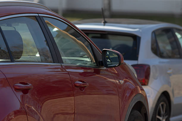 istock red and white cars parked side by side create visual contrast 2241666026