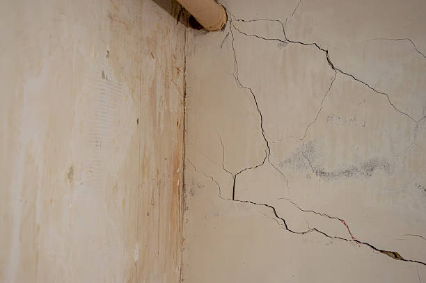 istock Visible cracks in the walls of an aged structure suggest potential damage, highlighting the need for repair and maintenance work 2241668152