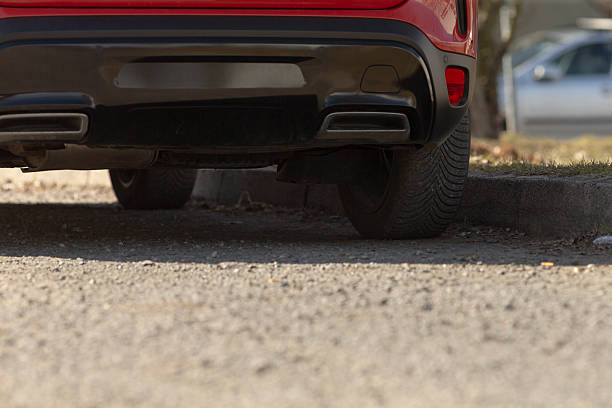 istock red bumper closeup, red rear bumper contrasts textured stone 2241669304