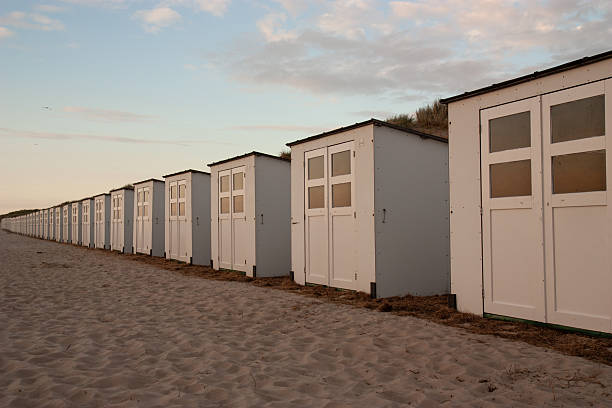 istock A long line of identical white beach huts facing the sea Texel 2241669413