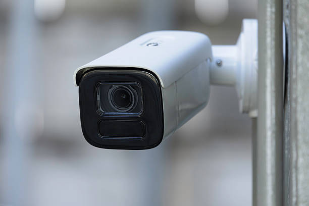 istock Close up view of a modern security camera outdoors 2241669580
