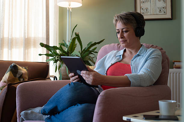 istock A woman is making online calls from home using a tablet. 2241672625