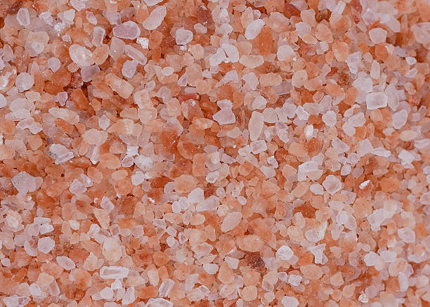 istock Close-up of pink Himalayan salt grains 2241678994