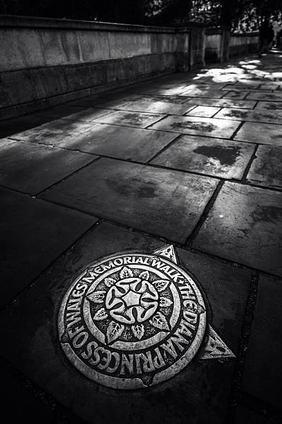 London, United Kingdom - October 14,  2022 - Black and white image of one of the 90 aluminium plaques marking the Diana, Princess of Wales Memorial Walk along the seven-mile circular trail through London's royal parks.