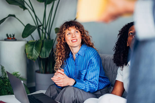 istock Professional Business Discussion in a Relaxing Office Environment with Plants 2241691455