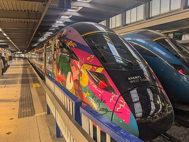 London, UK - September 06 2025: An Avanti West Coast Class 390 Pendolino train with a colorful 'Progress' Pride livery standing at a platform in Euston Station ready for departure