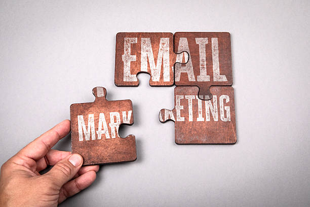 istock Hand Completing Puzzle with Words Email Marketing Representing Digital Communication and Business Strategy Concept 2241695541