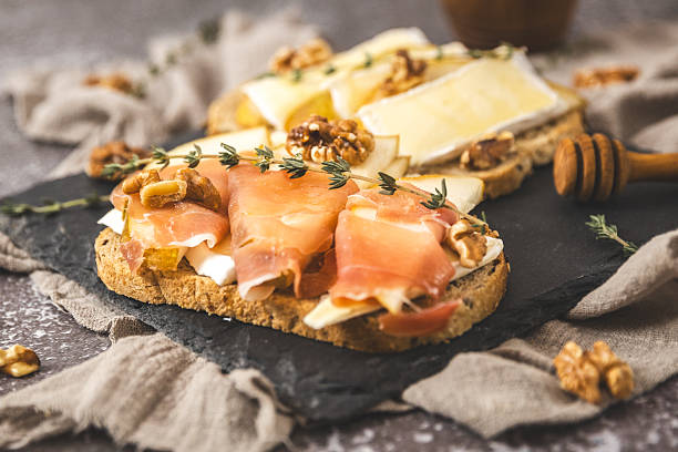 istock A tray with two delicious sandwiches on the table. 2241701782