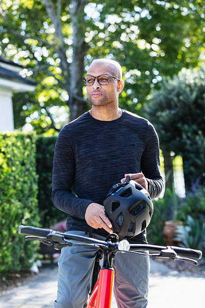 istock African-American man getting ready to go biking 2241704596