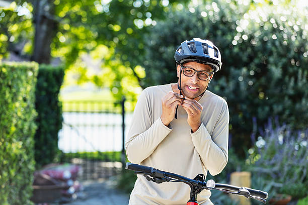 African-American man getting ready to go biking