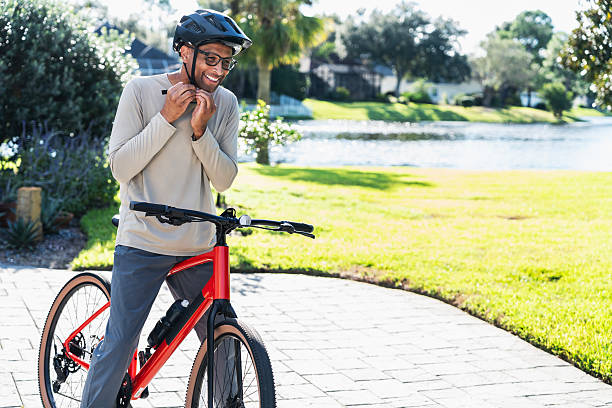 istock African-American man getting ready to go biking 2241704648