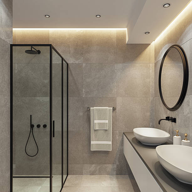 istock Spacious Bathroom with Double Vanity and Round Mirrors 2241708380