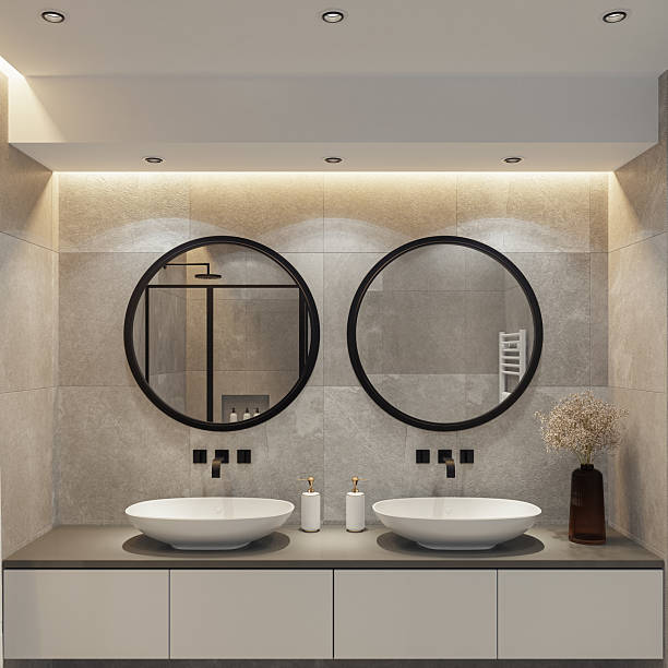 istock Spacious Bathroom with Double Vanity and Round Mirrors 2241708382