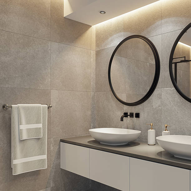 istock Spacious Bathroom with Double Vanity and Round Mirrors 2241708398