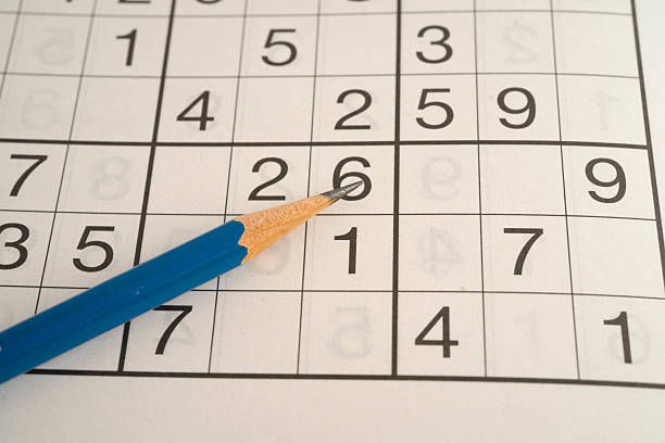 istock Sudoku puzzle, game to play for keep you brain younger for developing Alzheimer disease in senior patient. 2241711571