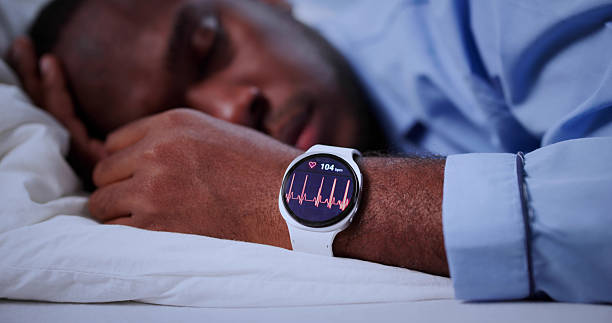 istock Man Using Smartwatch To Track Sleep 2241719856