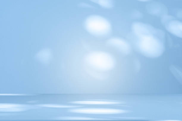 istock Studio style background wall decoration presentation uses white and blue tones. with shadows cast from a nearby window, concept creating a decorative 2241725967