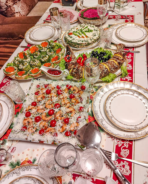istock Festive home dinner table with caviar and shrimp elegant table setting vertical frame 2241728136